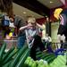 Roman Whitmore, 6, stomps on the balloon dragon on Sunday. Daniel Brenner I AnnArbor.com